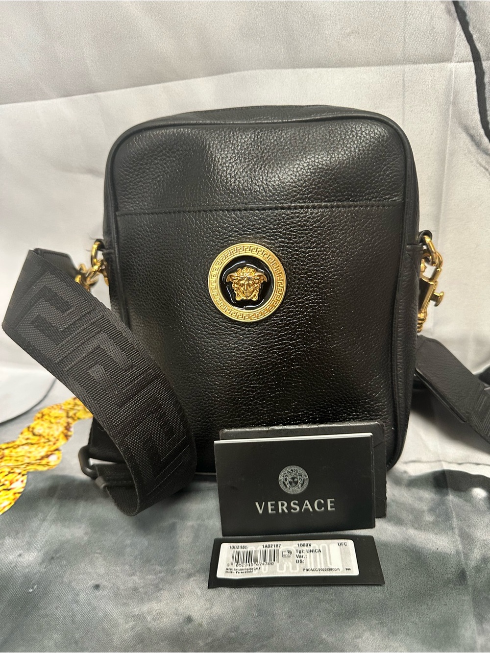 Versace Black Leather Messenger Bag with Gold Medusa Accent